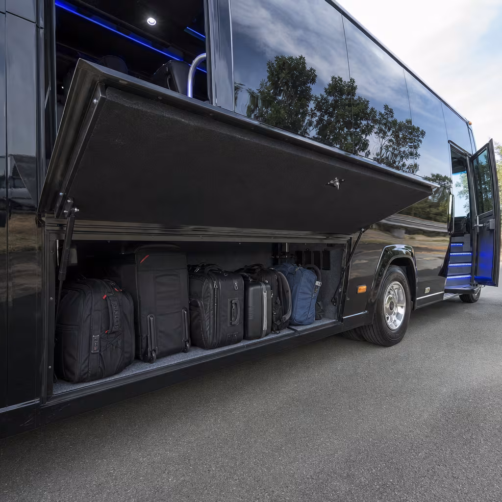 Party bus interior with wraparound leather seating and LED lighting in Boynton Beach